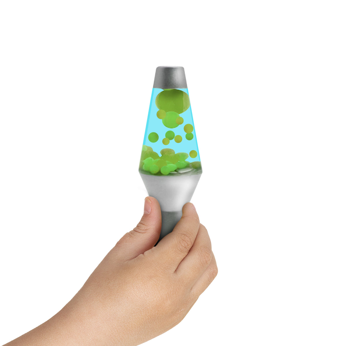 A small hand holding a miniature Lamp with green floating globs inside. The lamp has a silver base and cap, and the liquid inside is blue. The background is white.