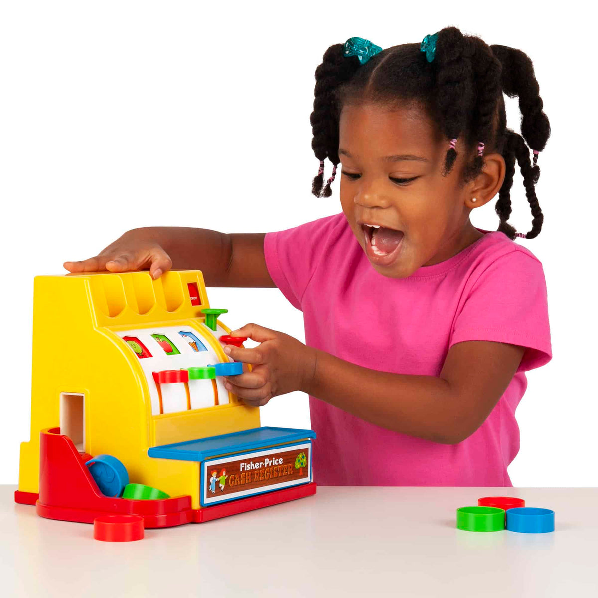 Lifestyle shot of girl playing with the Cash Register