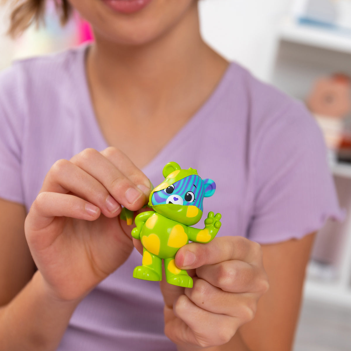 Peel and Reveal - Lifestyle shot of girl peeling bear
