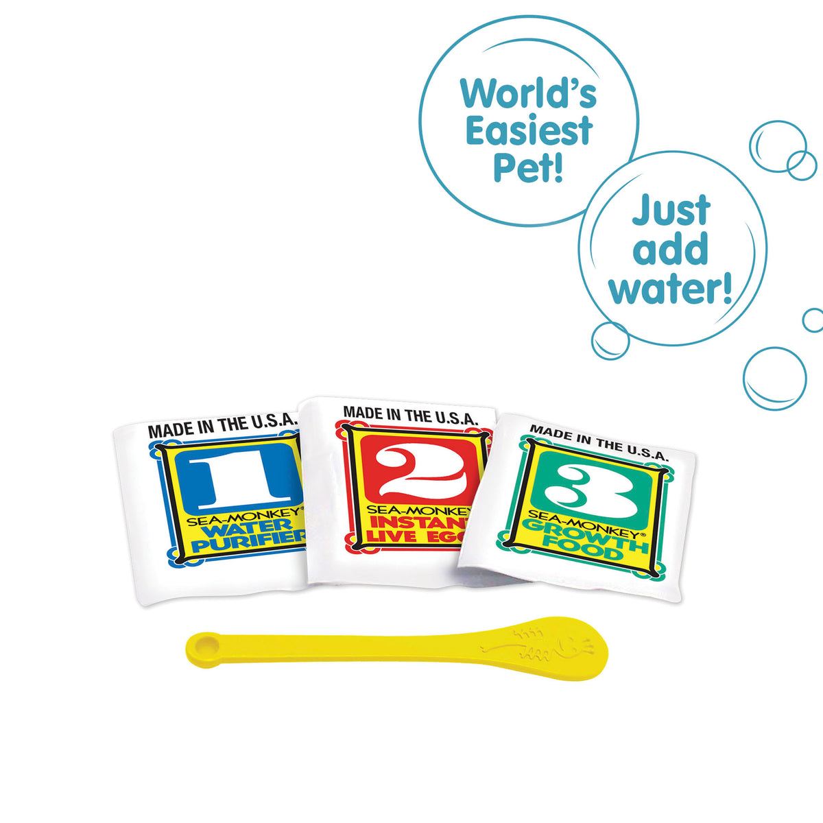 Three packets, numbered 1, 2, and 3 from left to right. There is a small yellow spoon laying in front of the packets. There are two callouts in circles. One reads "World's Easiest Pet!" and the other reads "Just add water!"