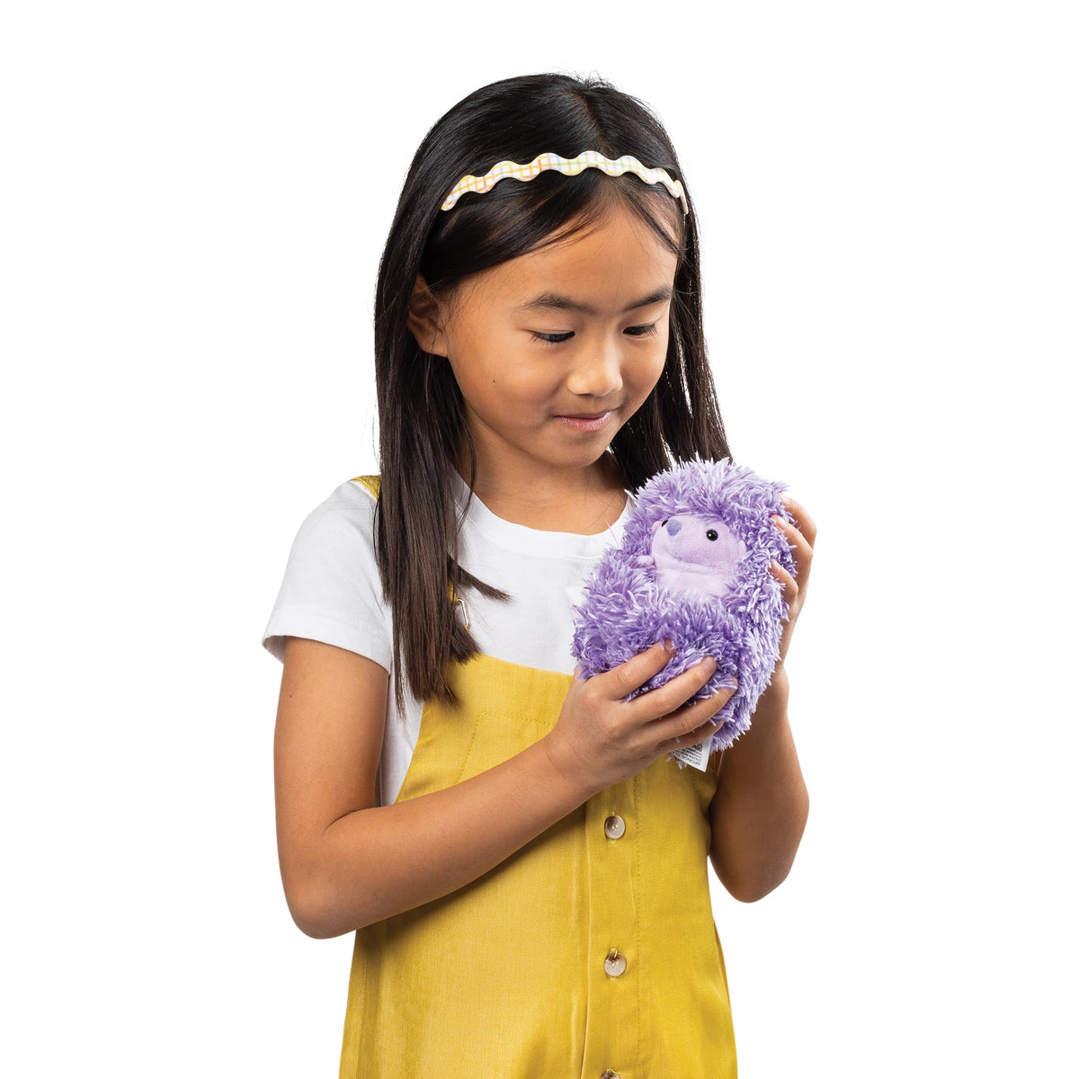 Girl holding Higgle Hedgehog