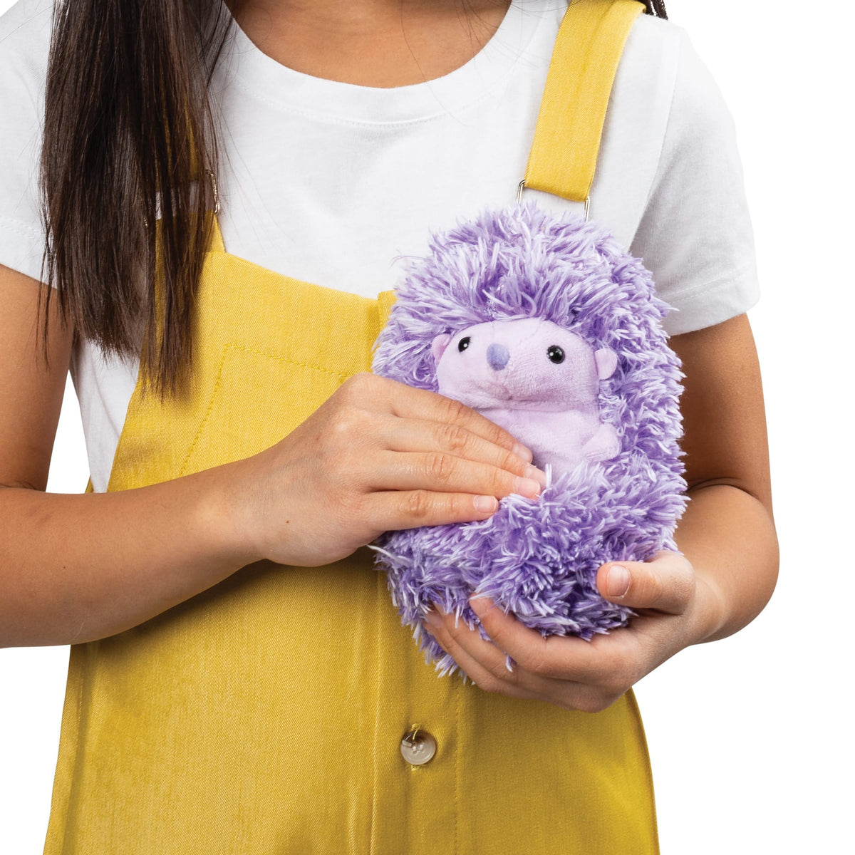 Closeup Photo of a Girl holding Higgle Hedgehog