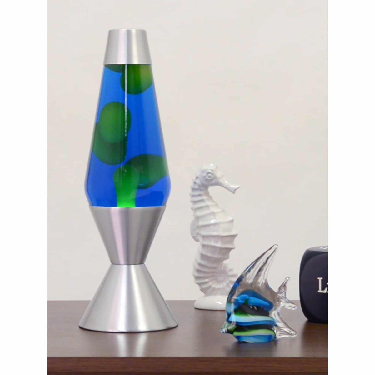 16.3” Lamp – Yellow/Blue/Silver on a table with ocean themed knick knacks