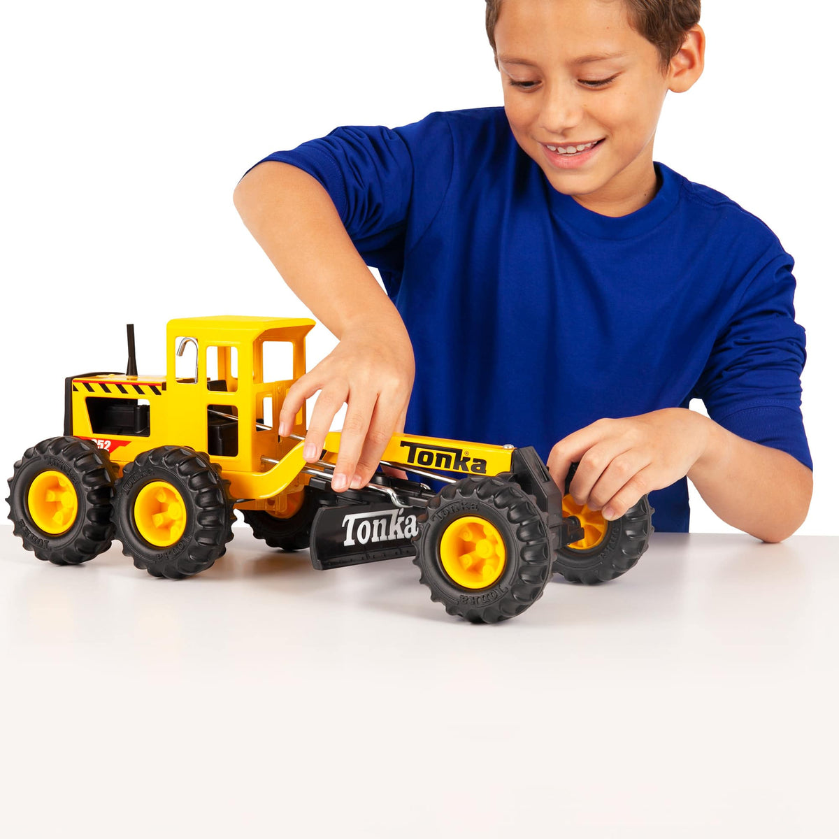 Road Grader - Lifestyle shot with a boy playing with the Road Grader