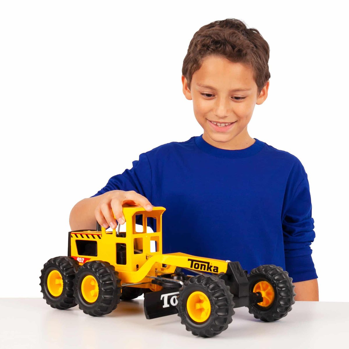 Road Grader - Lifestyle shot with a boy playing with the Road Grader