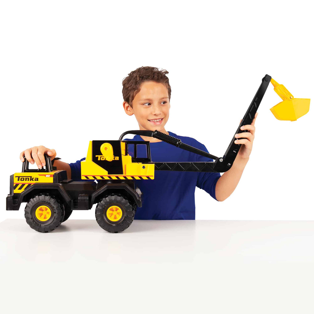 Crane lifestyle shot of boy lifting the crane