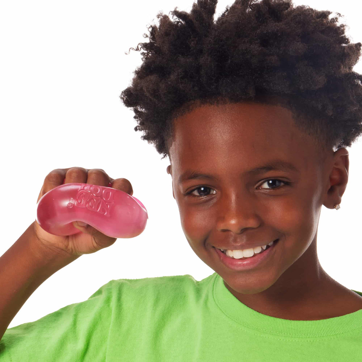 Nice Cube Lifestyle of boy squeezing pink Nice Cube
