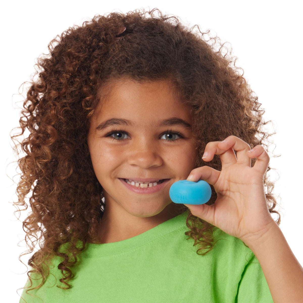 Girl squeezing a blue Teenie